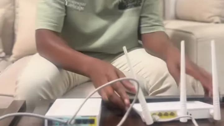 Dennis connecting a MikroTik RB951 to a Tenda F3 for a PPPoE customer