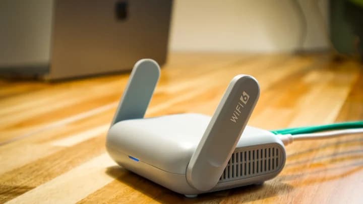Clear close-up of a wired WiFi router used in a MikroTik PPPoE setup